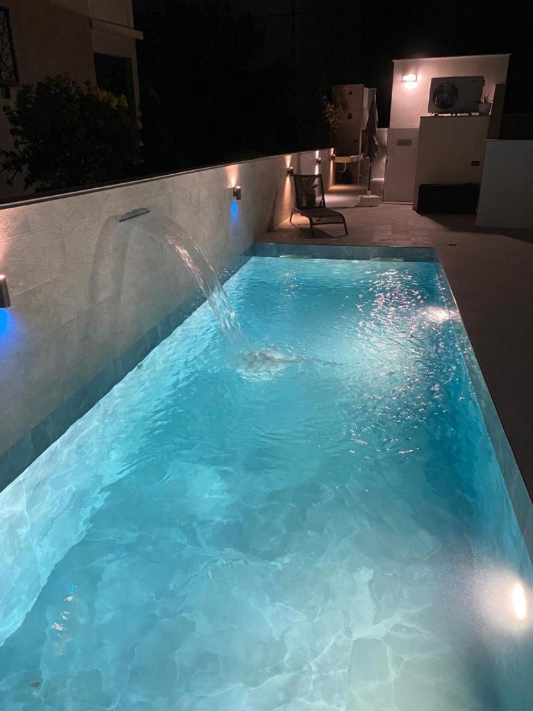 Apartment Villa Rina- Heated salt water Pool view 3
