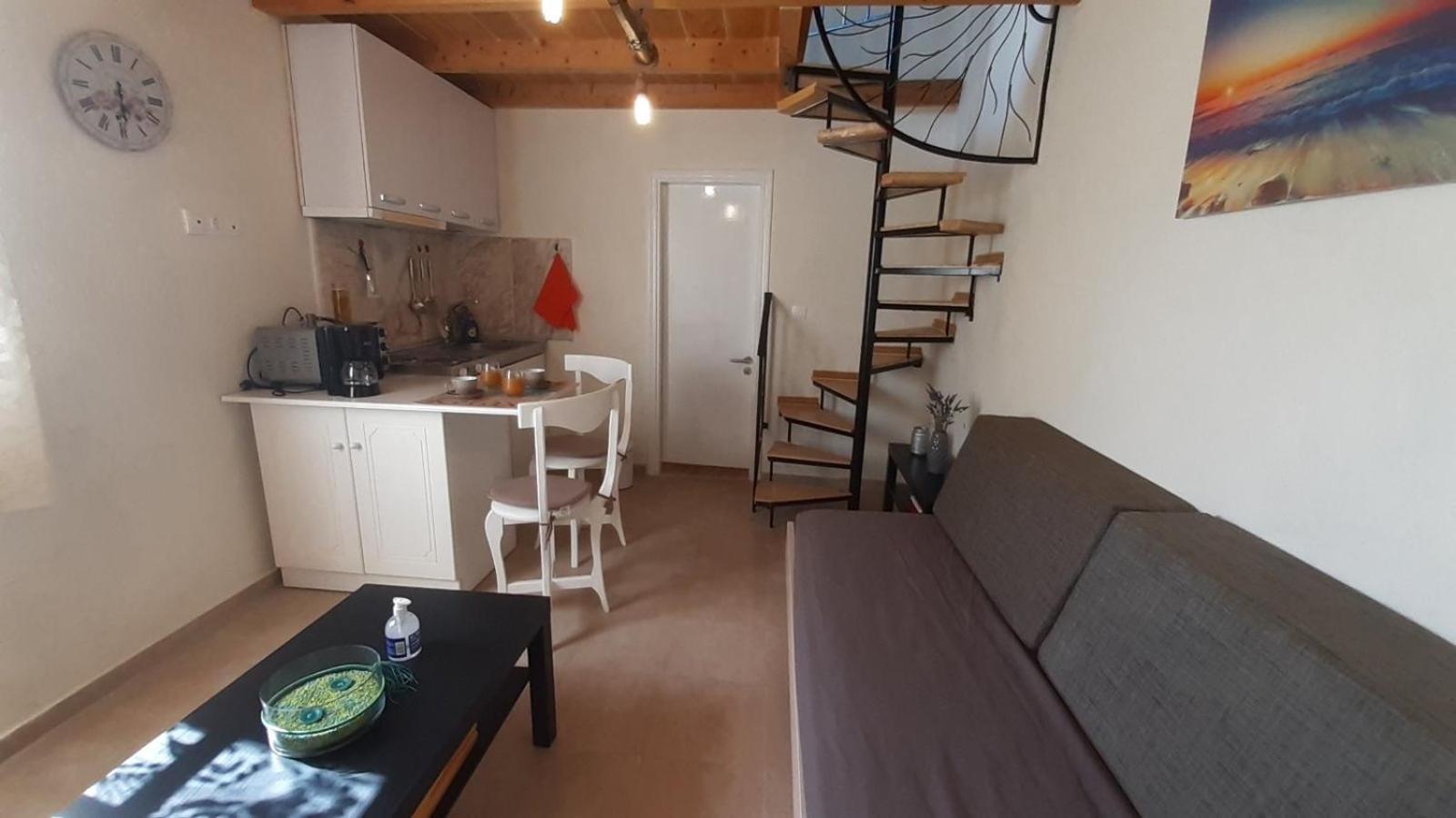 White Manolia Cottage view 4