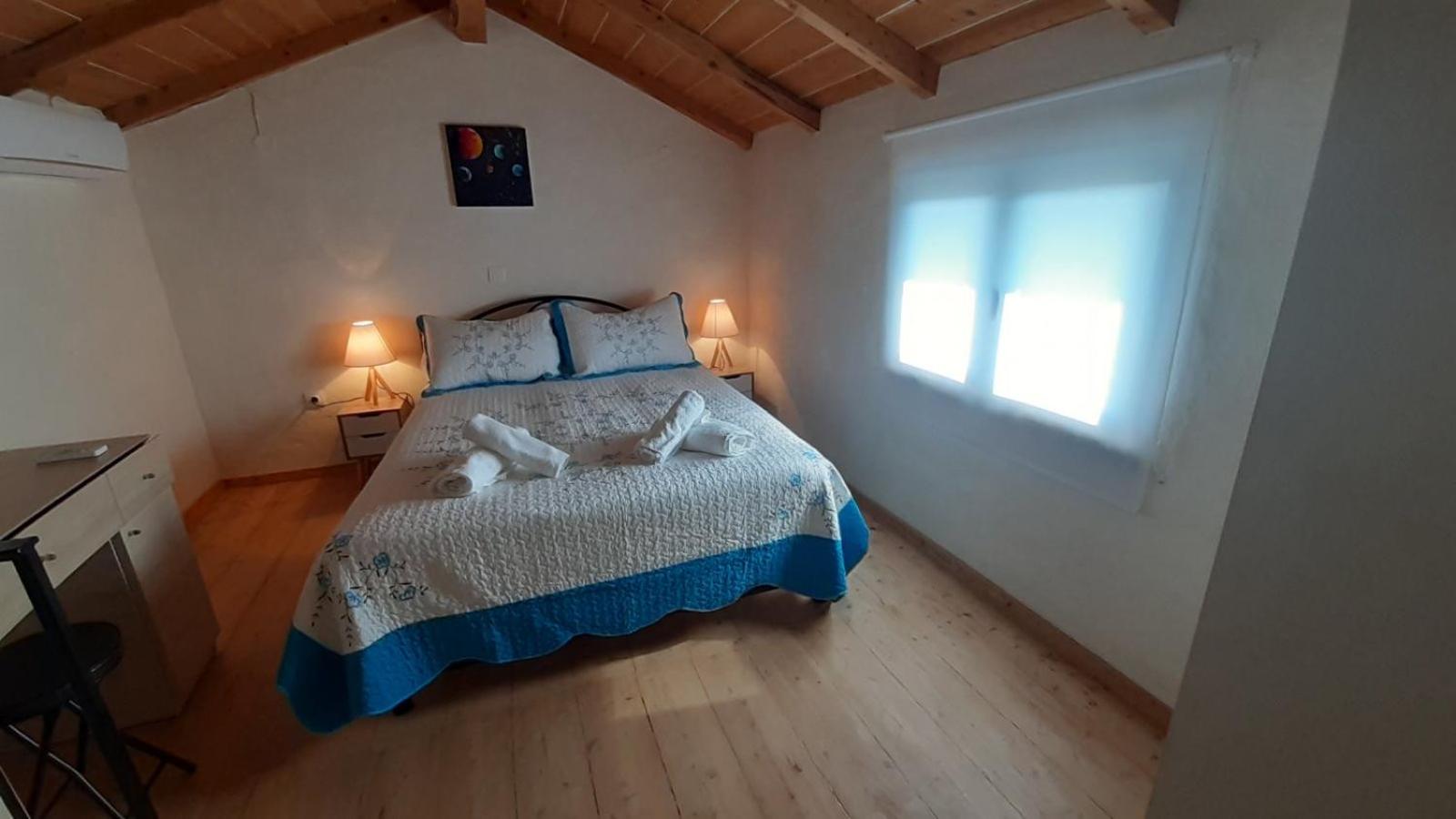 White Manolia Cottage view 5