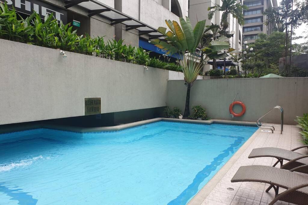 Studio in The Olympia, PRIME MAKATI LOCATION Near Ayala Triangle Gardens -FREE WIFI and Pool Use view 2