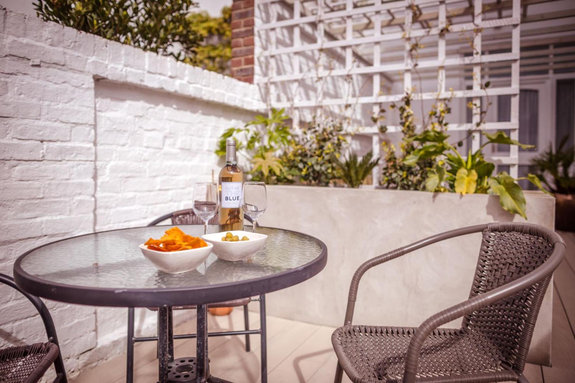 Olive Tree - fabulous central location with patio garden & parking space view 3