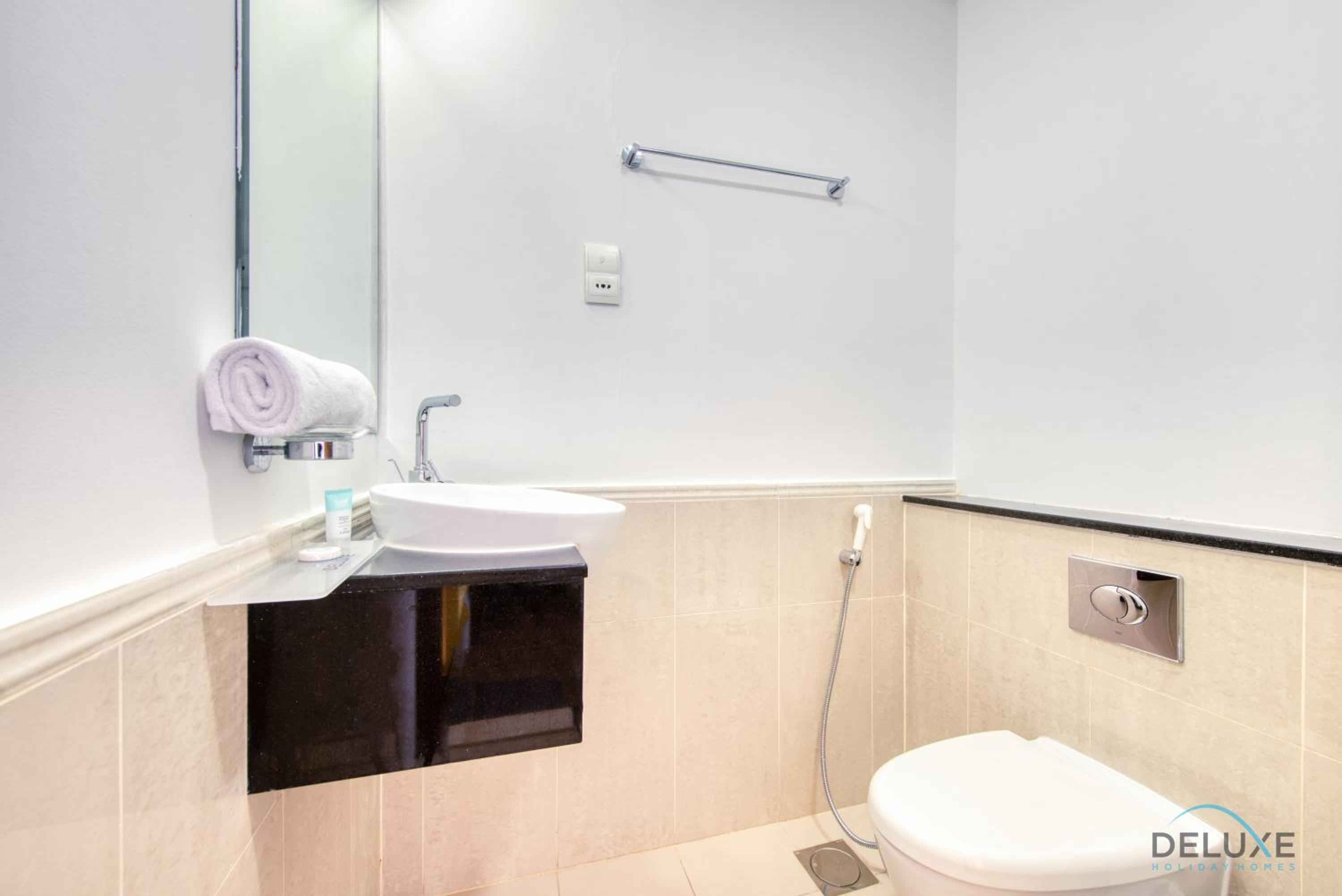 Homely 1BR at The Matrix Dubai Sports City by Deluxe Holiday Homes