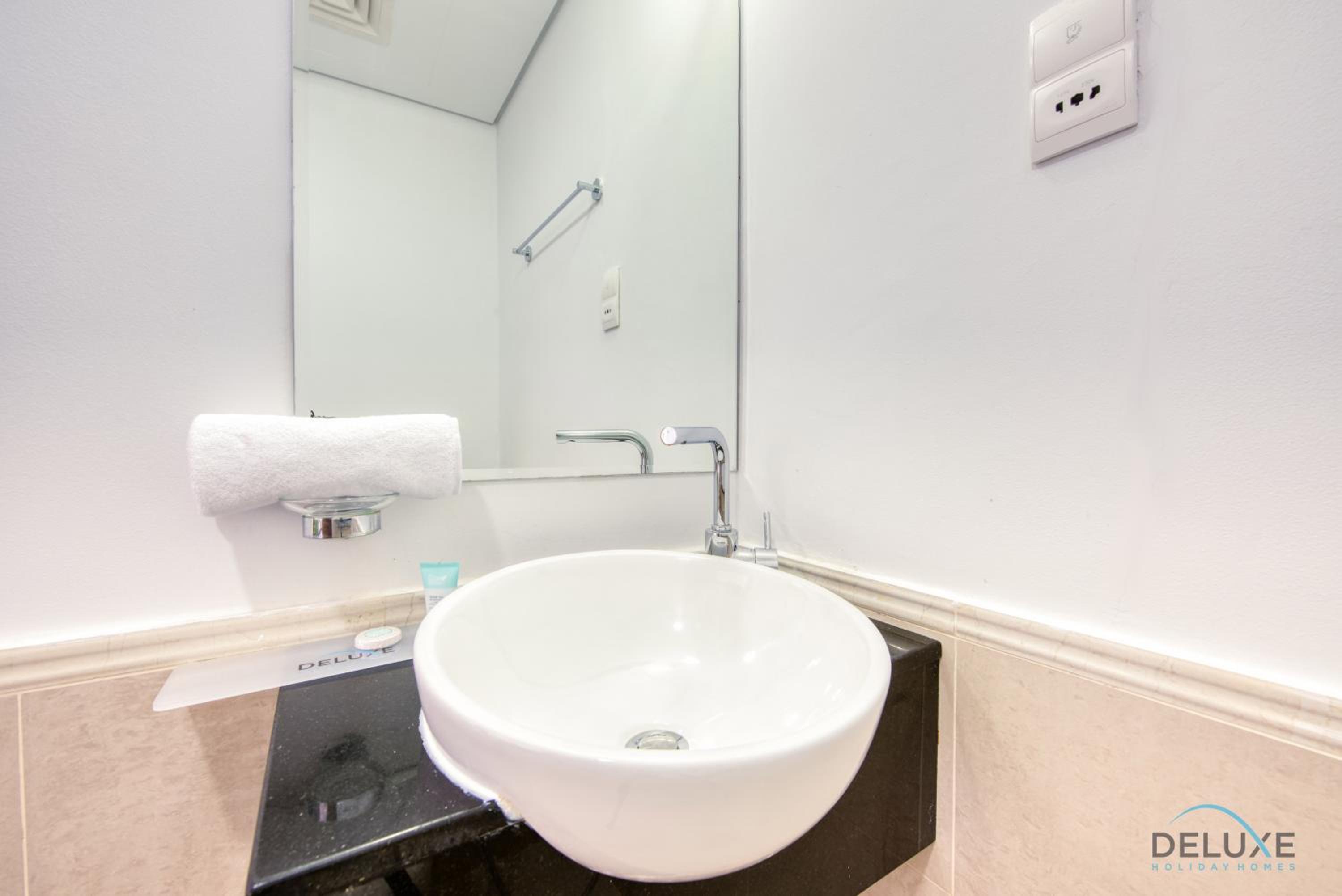 Homely 1BR at The Matrix Dubai Sports City by Deluxe Holiday Homes