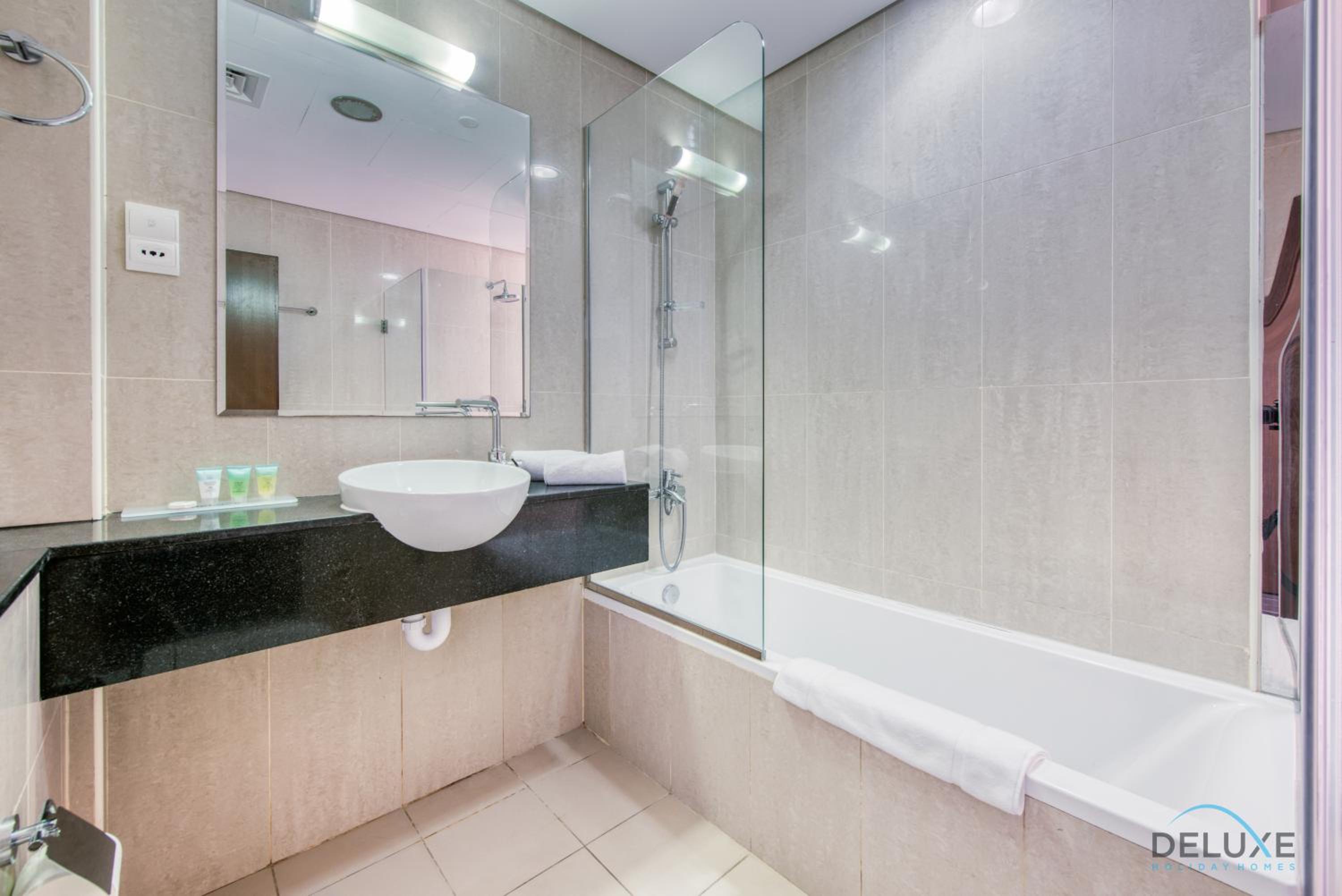 Homely 1BR at The Matrix Dubai Sports City by Deluxe Holiday Homes