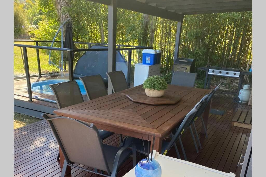 Relax in the spa with views opposite Lake Eildon