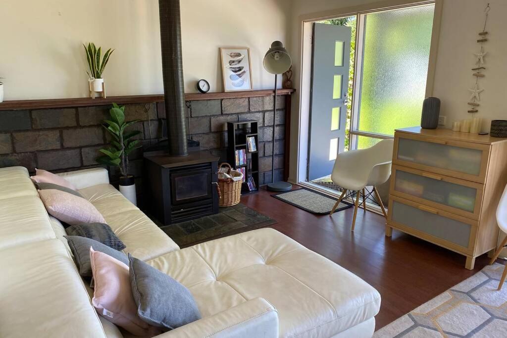 Relax in the spa with views opposite Lake Eildon