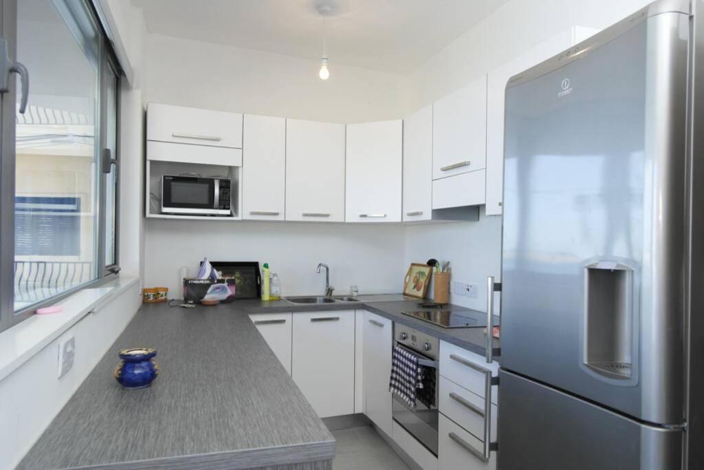 MEL 1 2BED seaview in Ghadira by Homely