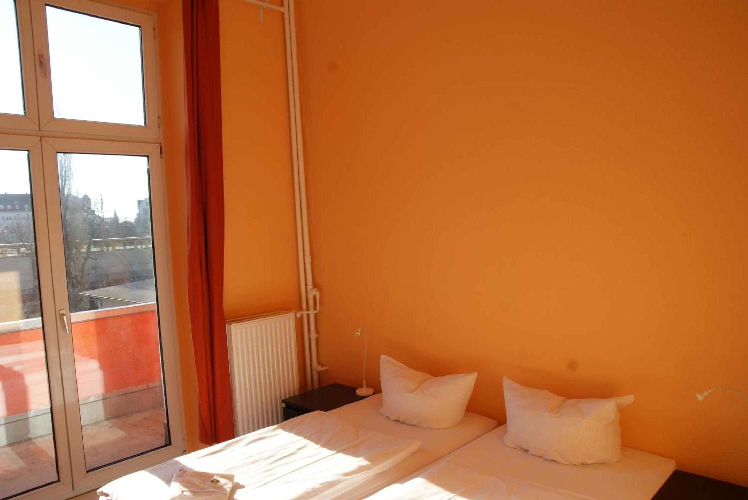 Happy Go Lucky Hotel + Hostel