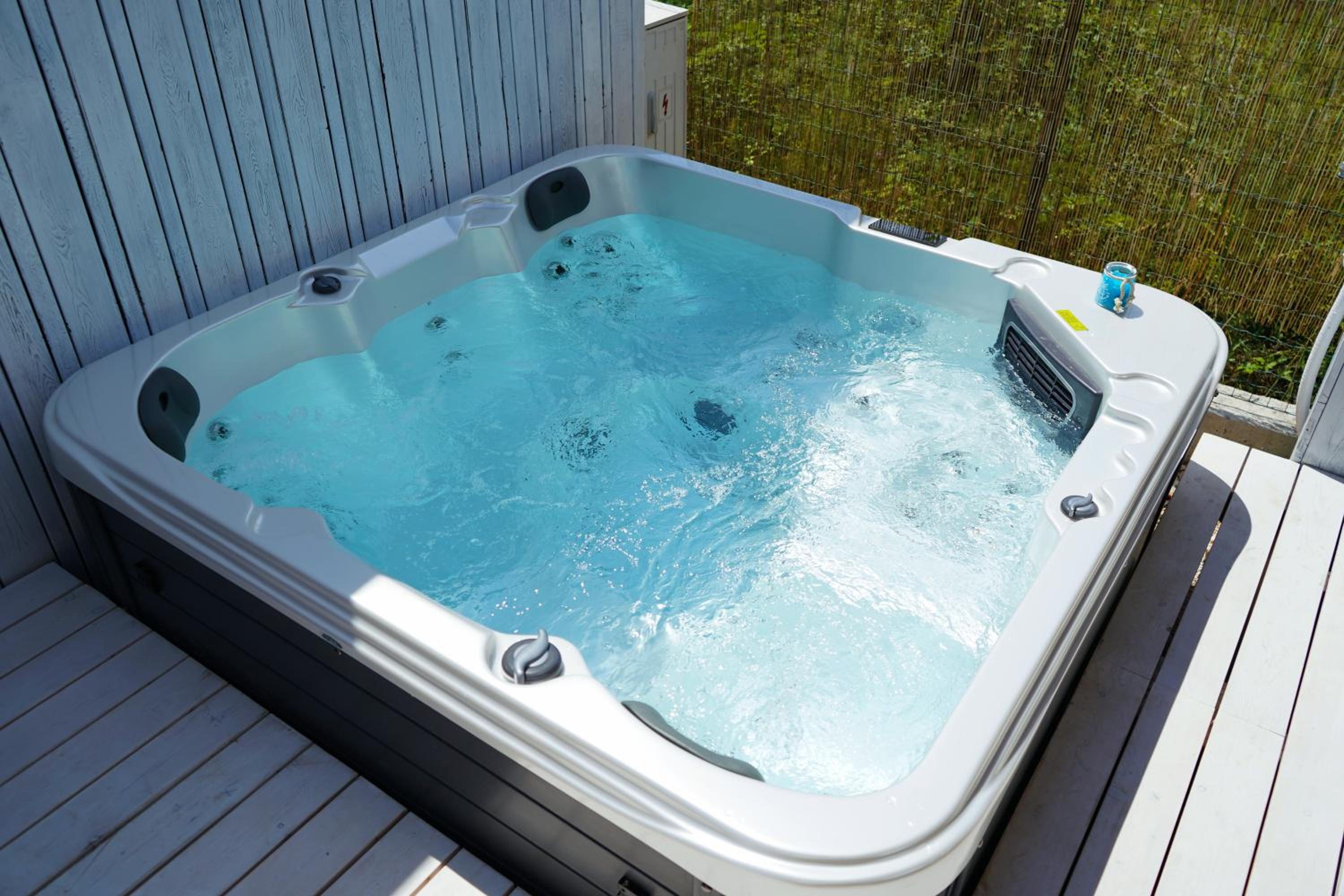 Boutique style eco-beachhouse, private jacuzzi view 2