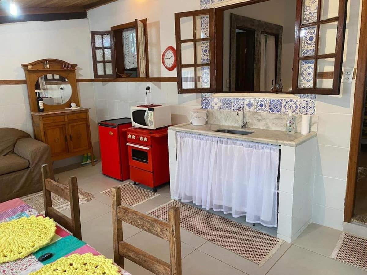 Casa COMPLETA, 2 quartos, Estacionamento GRATUITO, WIFI 300MB, frigobar, microondas, fogão e jardim