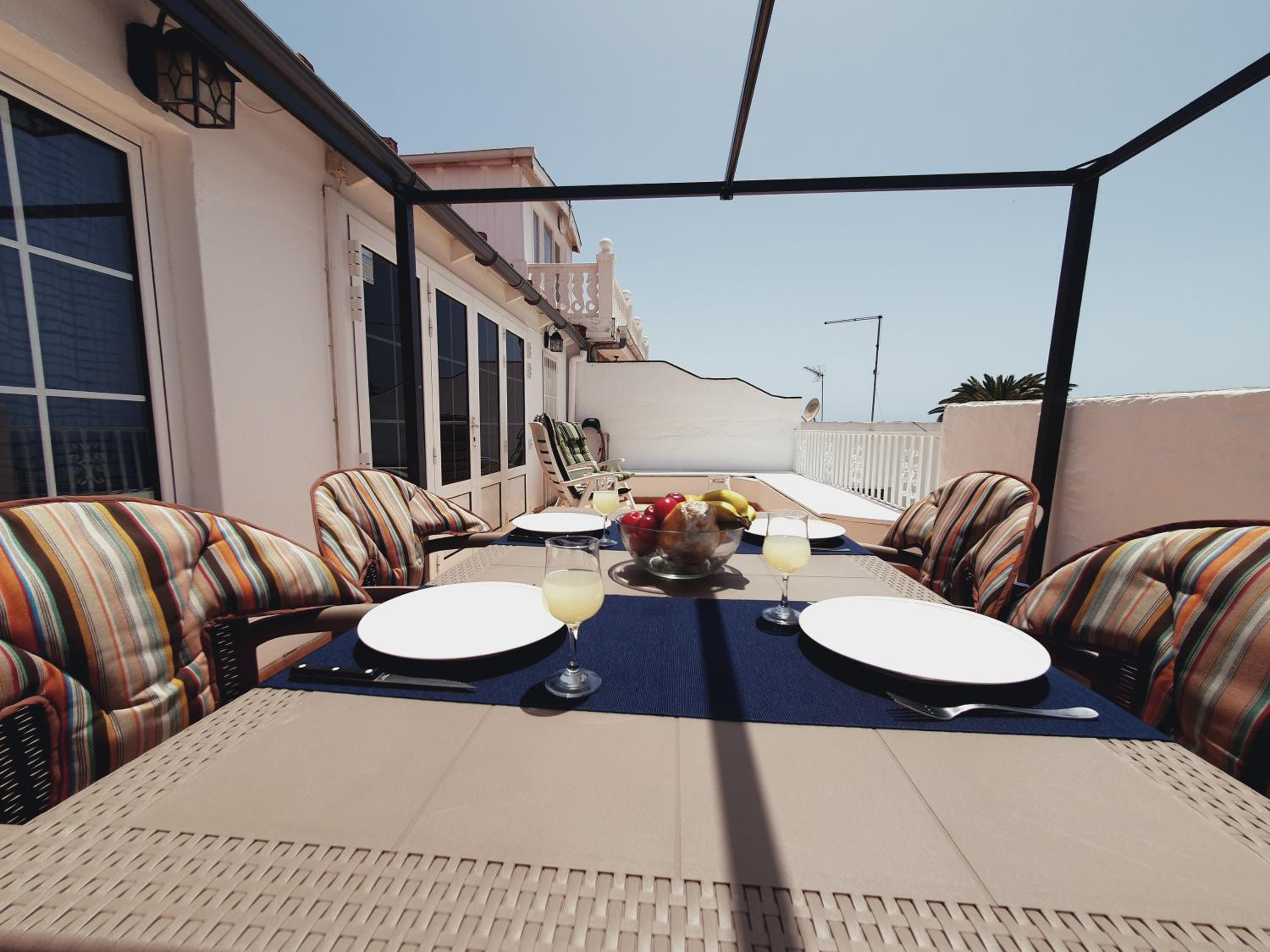 Sunset terrace with ocean views and pool access photo 2
