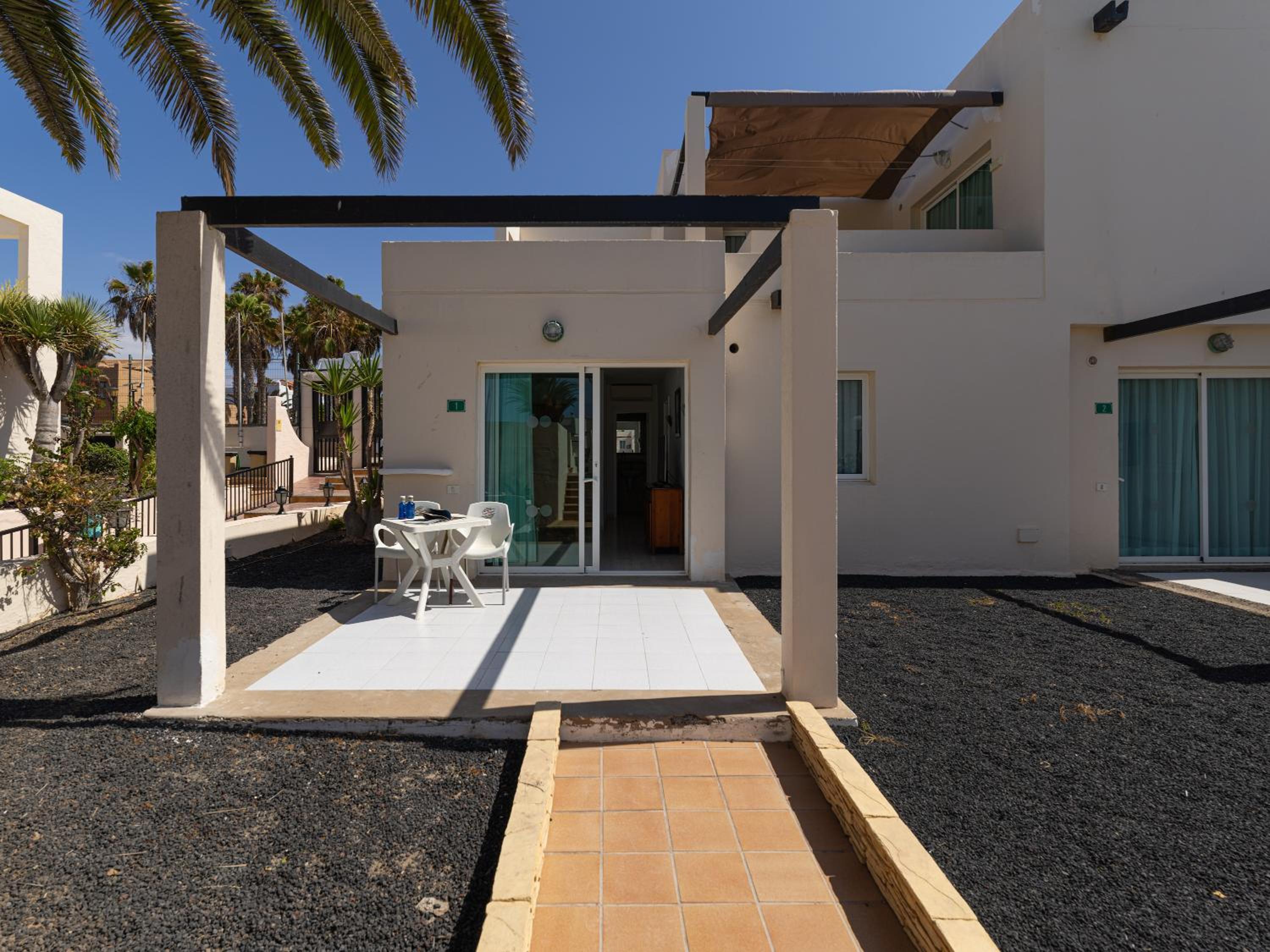 HomeforGuest Apartamento con terraza y piscina en Corralejo