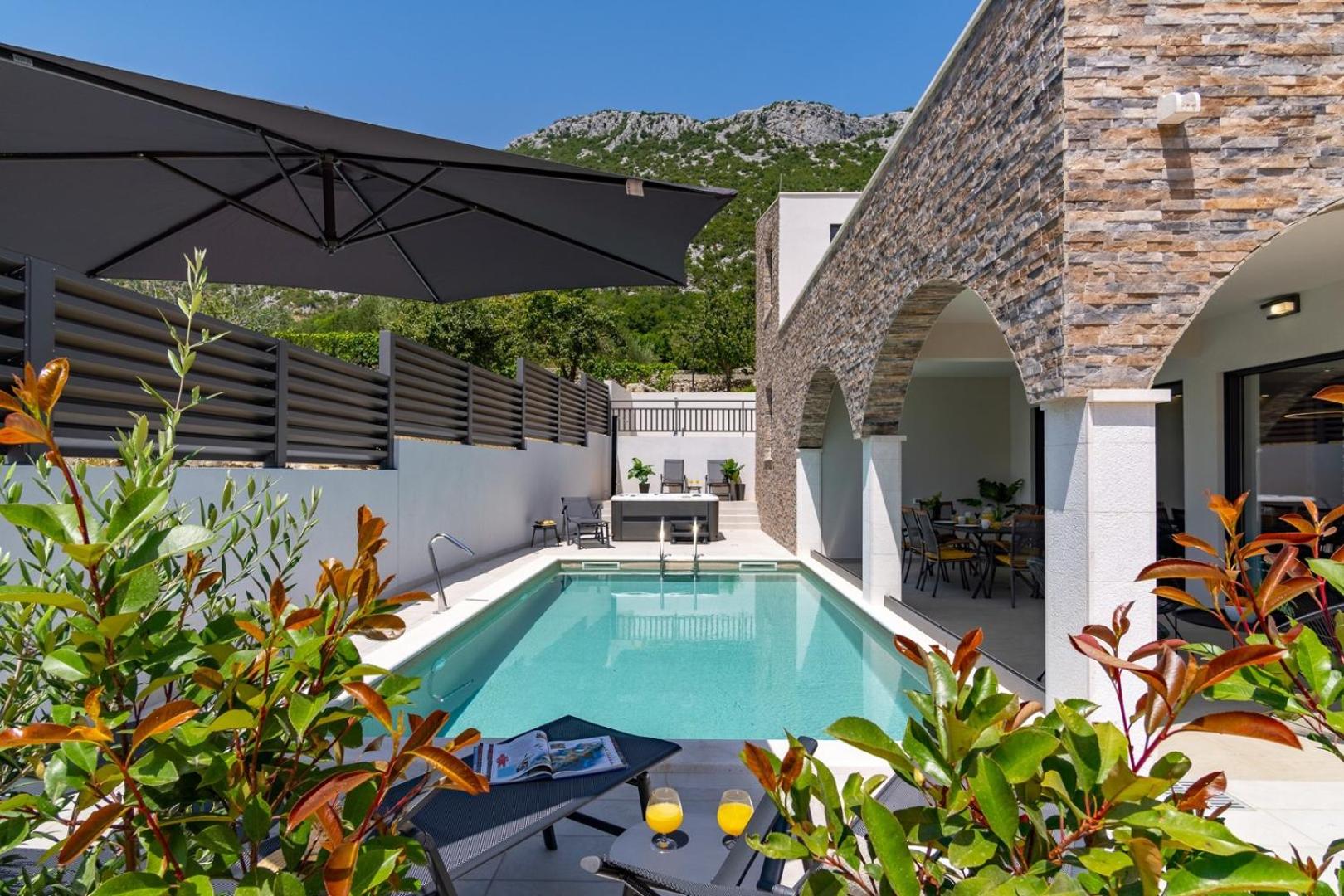 NEW! Villa EDEN with heated private pool, a hydromassage, a Hot-tub, fun zone with Treadmill, 4 en-suite bedrooms view 5