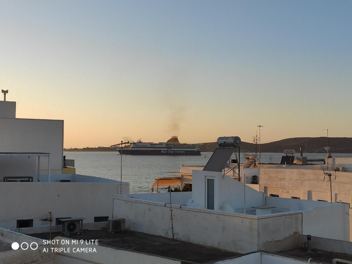 White cycladic town house with sea vew photo 4