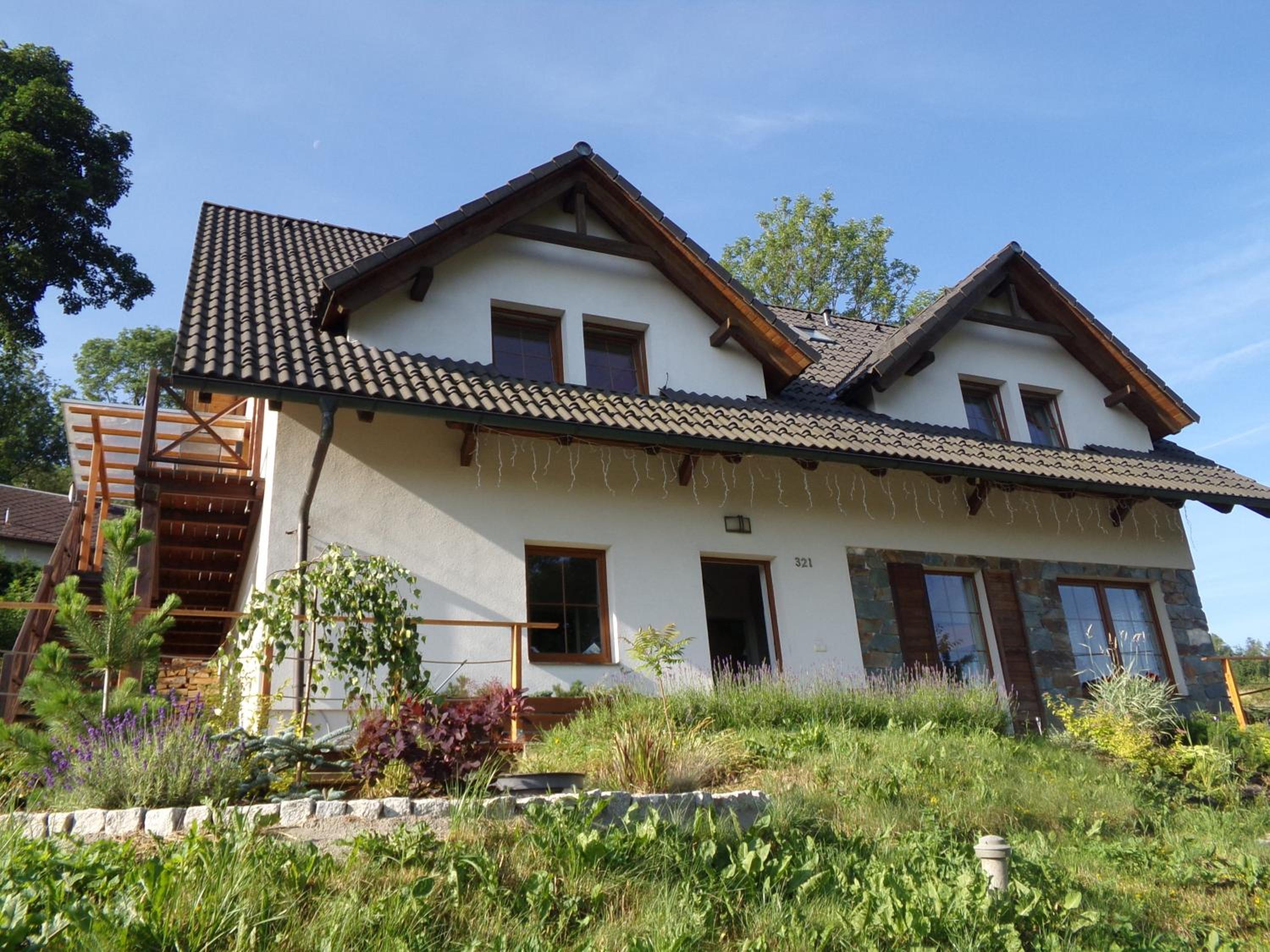 Motýlí chalupa - luxusní apartmány u Ještědu