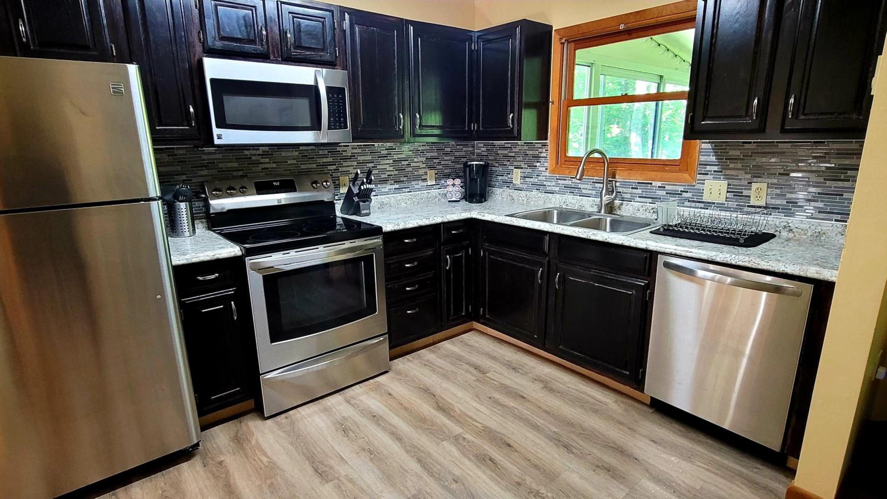 The Pocono's Retreat with a Gameroom, Firepit, and Lake view 4