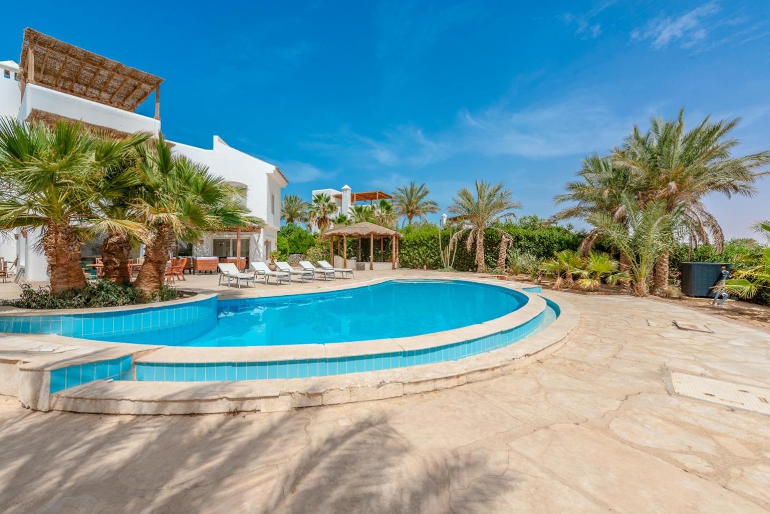 Beautiful 4 bedroom White Villa with Heated Pool view 2