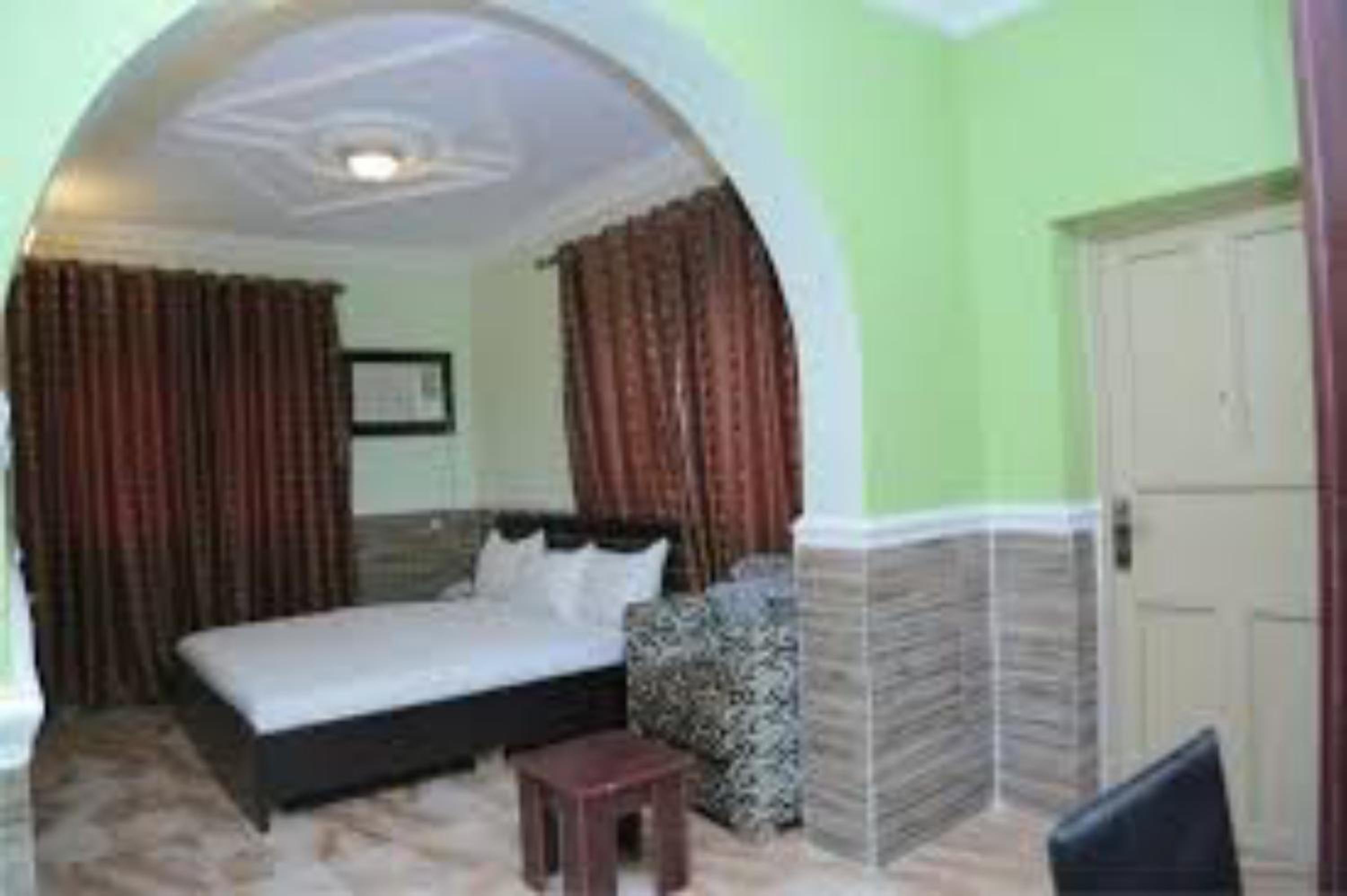 Dilida Guest Suites - Guest Room