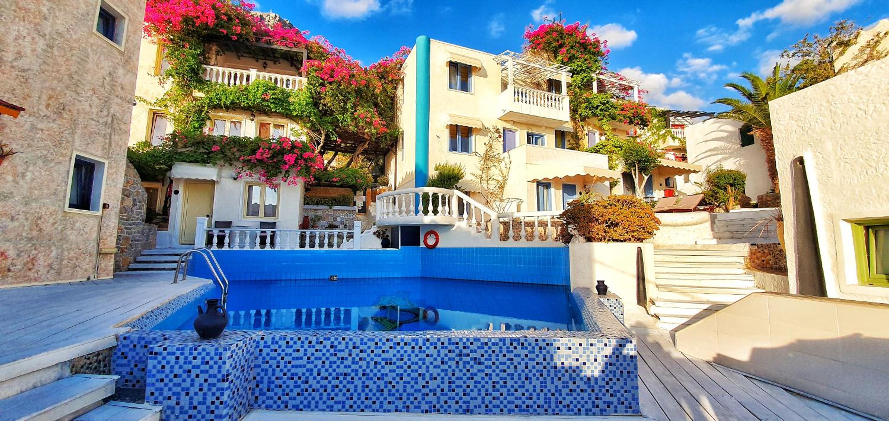 Standard big room apartment in blue Aegean with shared pool, kitchen and Ac view 3