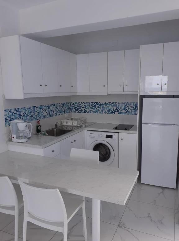 Blue and White Studios & Apartments