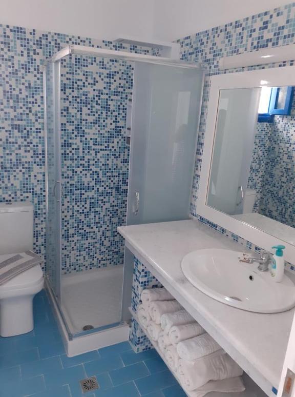 Blue and White Studios & Apartments
