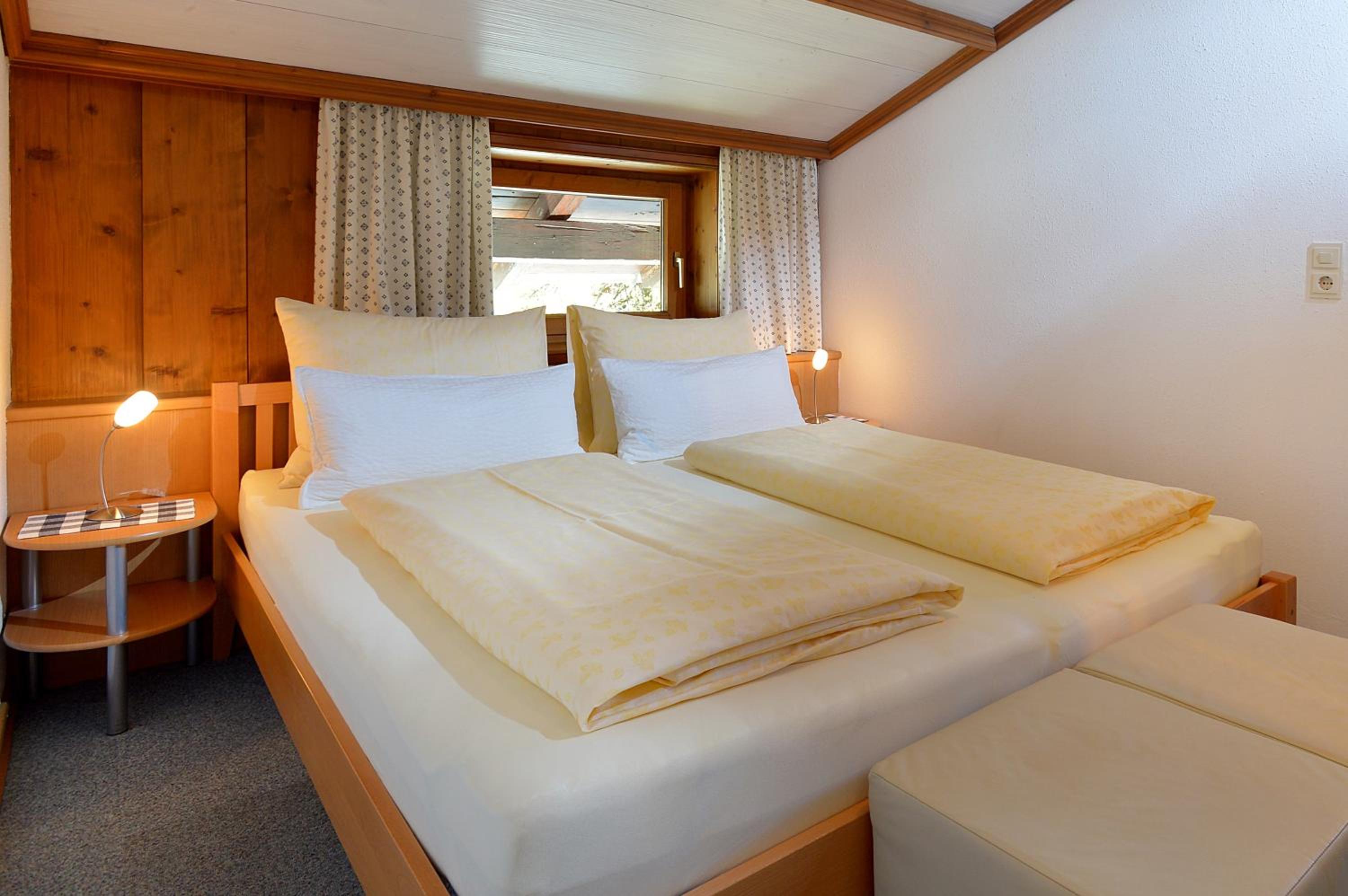 Pension Hinterholzer Apartments und Zimmer