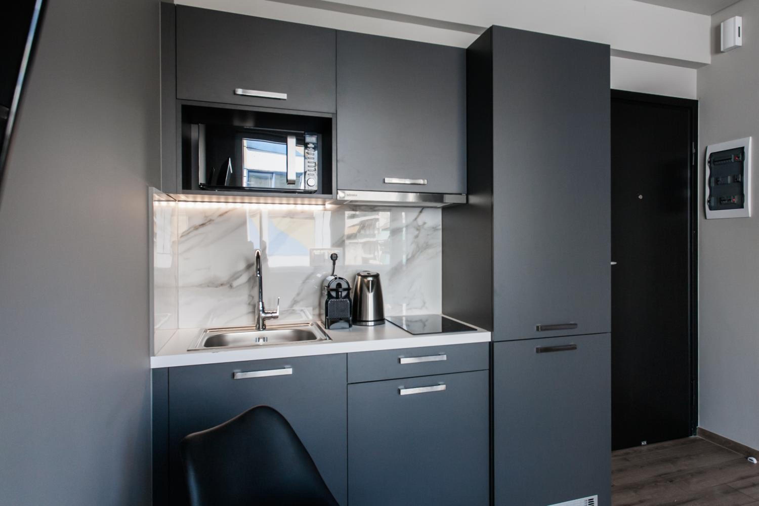 WYZ Athens Apartments by UPSTREET