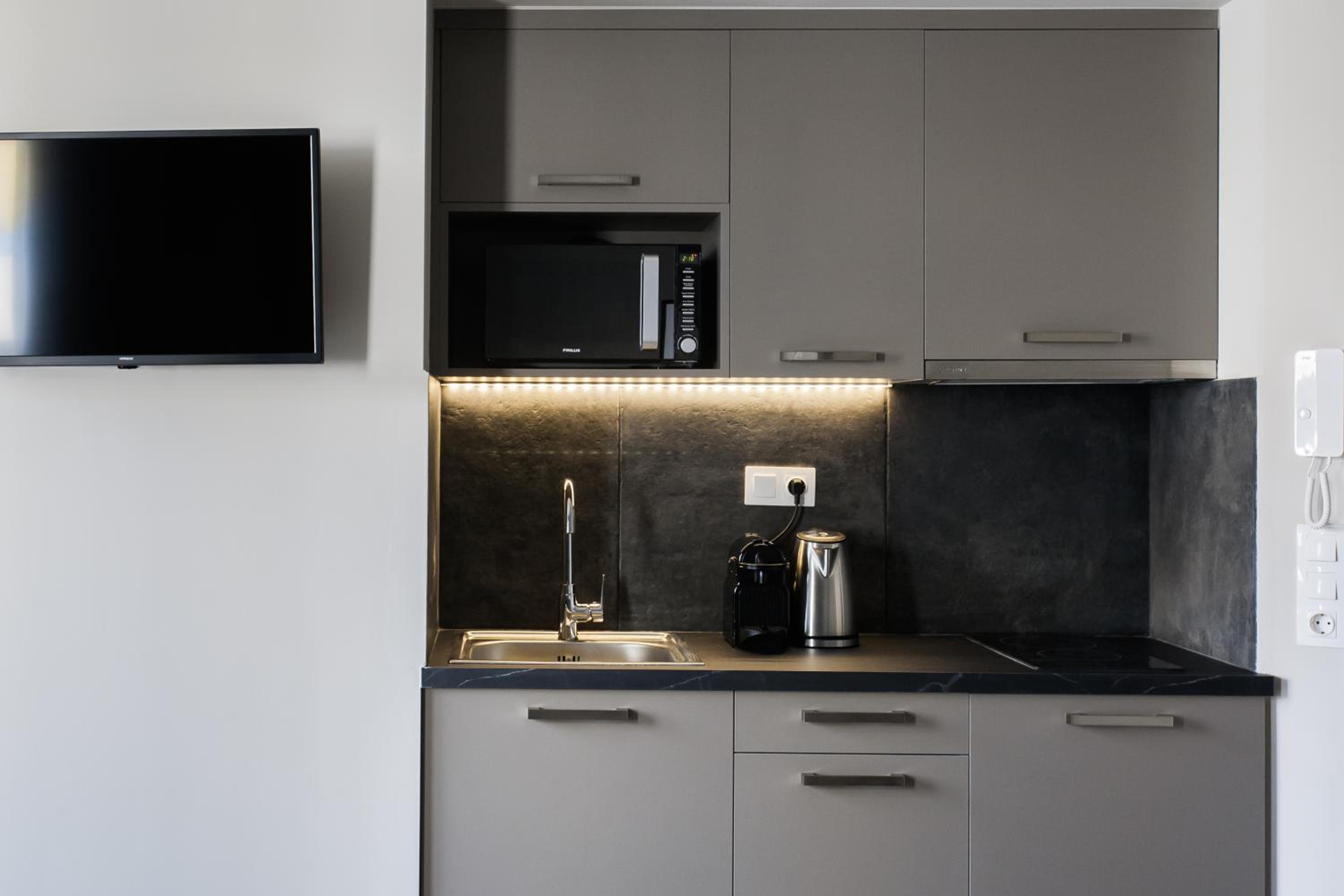 WYZ Athens Apartments by UPSTREET