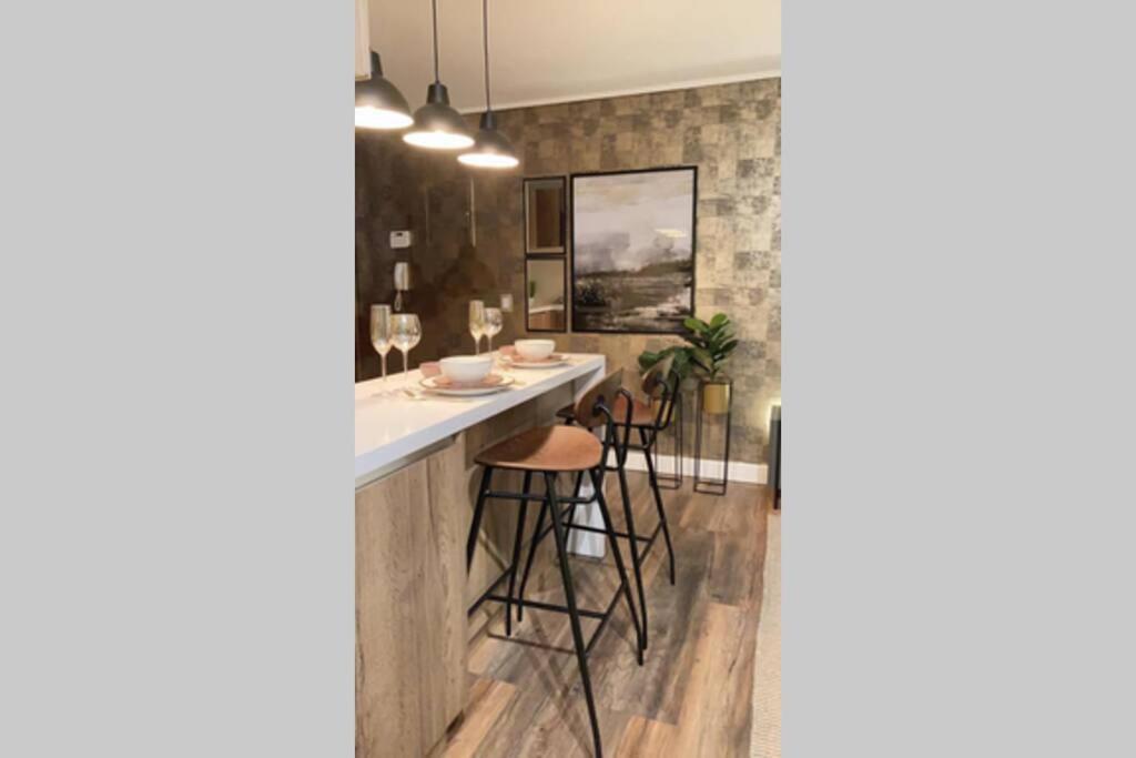 Departamento de lujo en suite, en el piso 38, Las Condes, costado de parques y malls