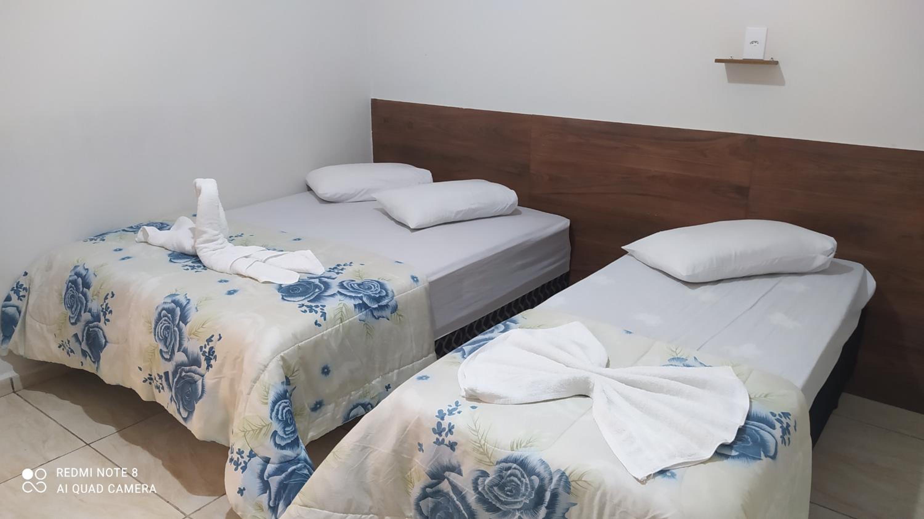 Pousada Quarto com tv,ar,frigobar,wifi e garagem