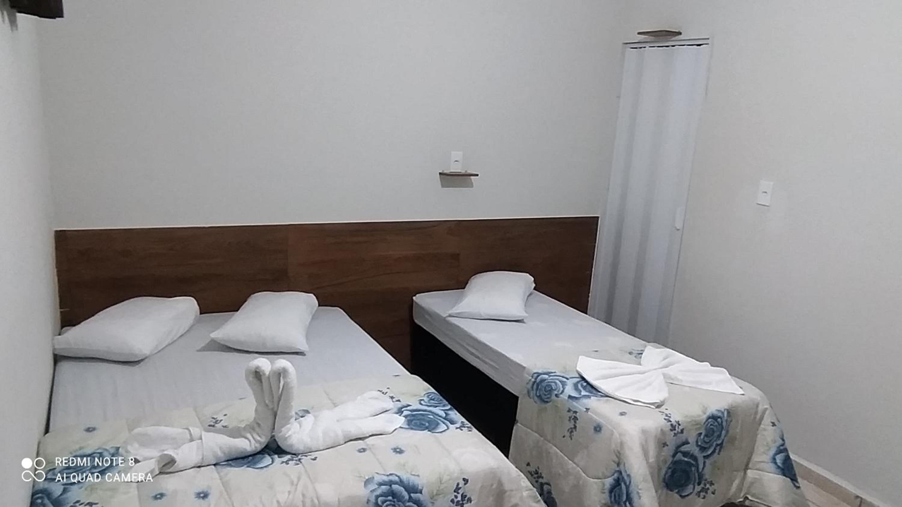 Pousada Quarto com tv,ar,frigobar,wifi e garagem