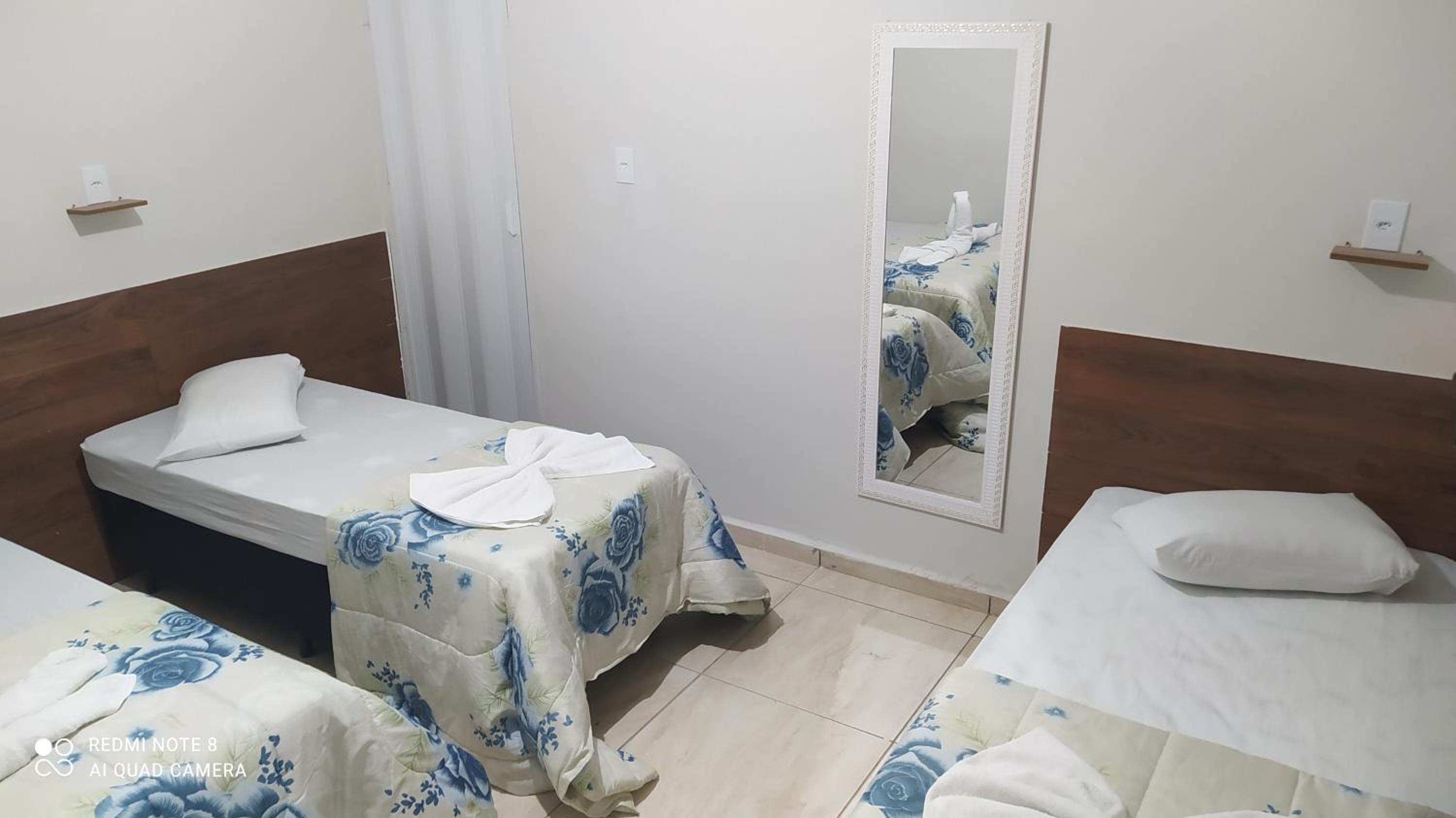 Pousada Quarto com tv,ar,frigobar,wifi e garagem