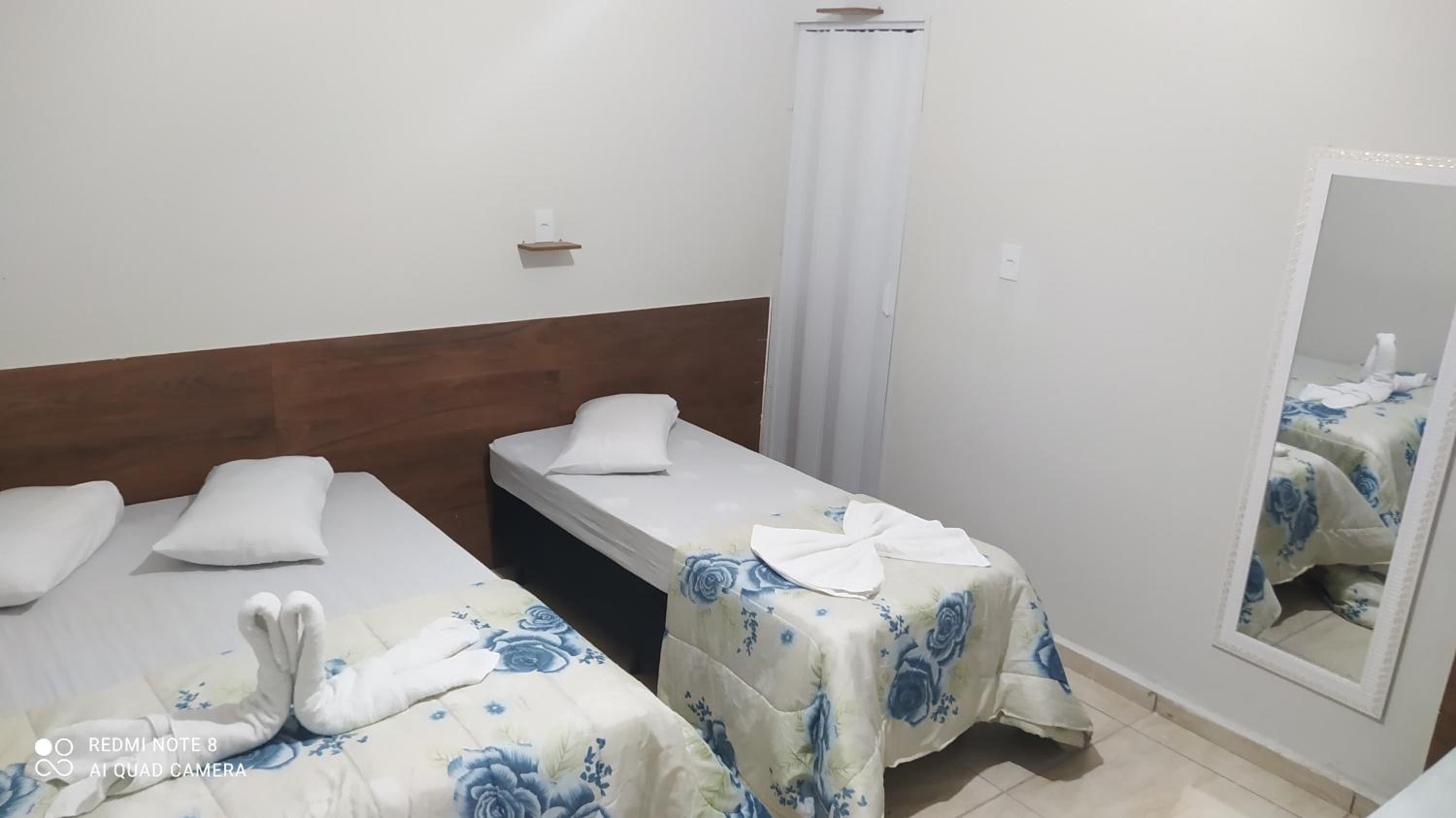 Pousada Quarto com tv,ar,frigobar,wifi e garagem