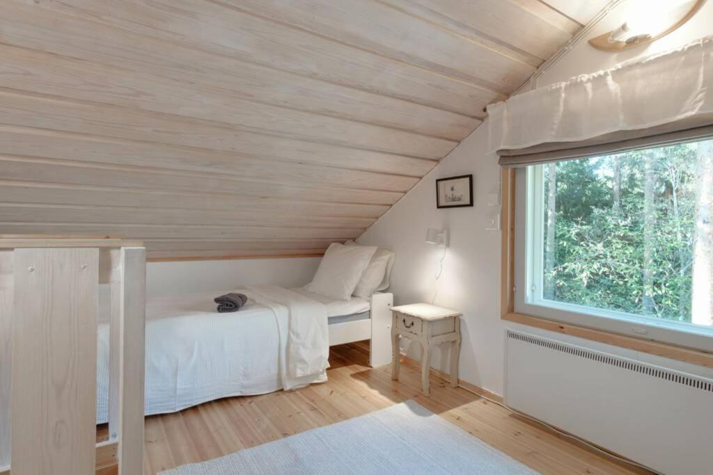 Sirpa's Artistic Nuuksio Retreat with Heated Pool