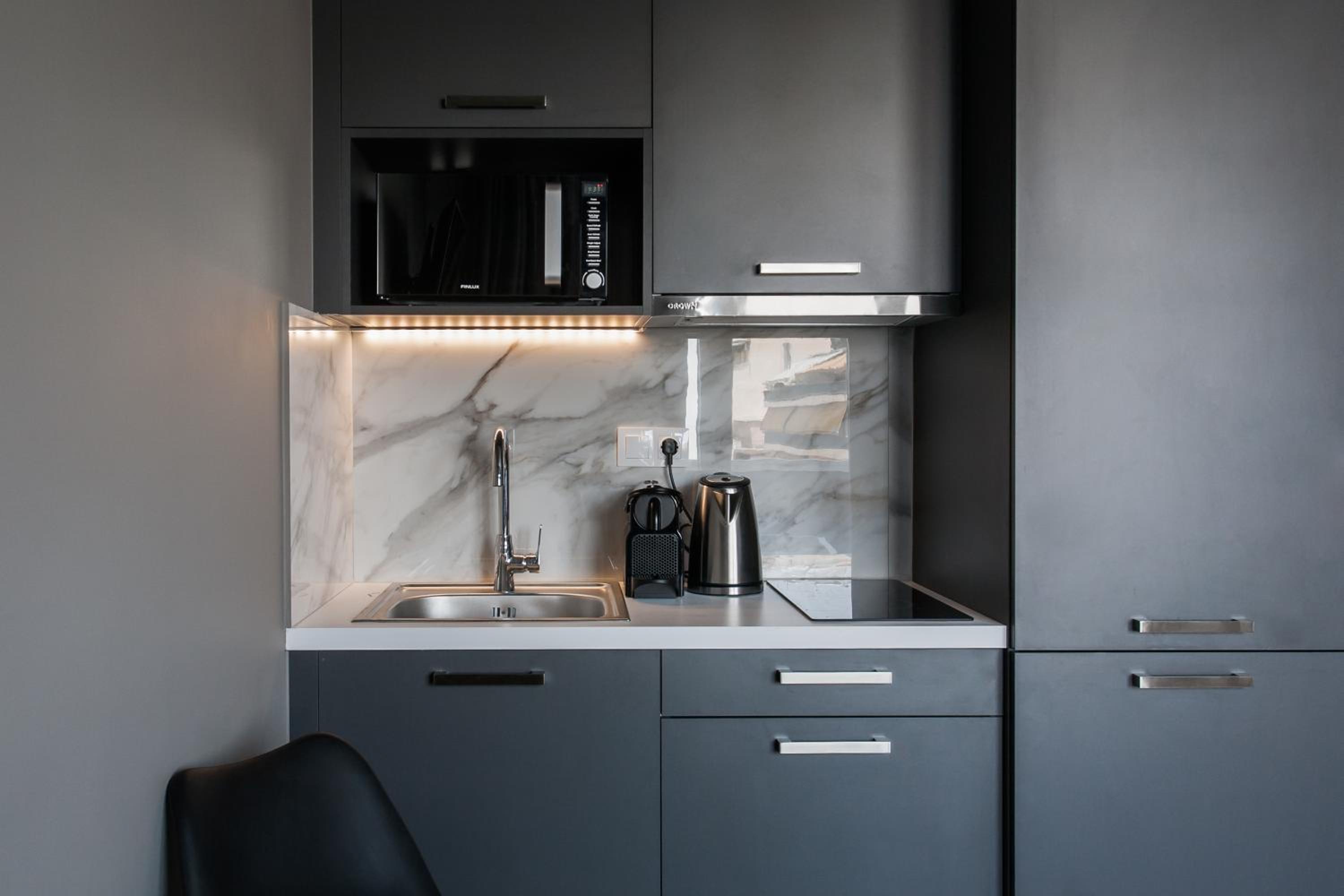 WYZ Athens Apartments by UPSTREET