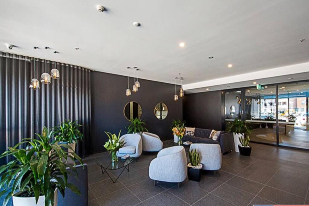 Luxe 2BR Executive Apartment Kingston Pool Parking WiFi BBQ Wine