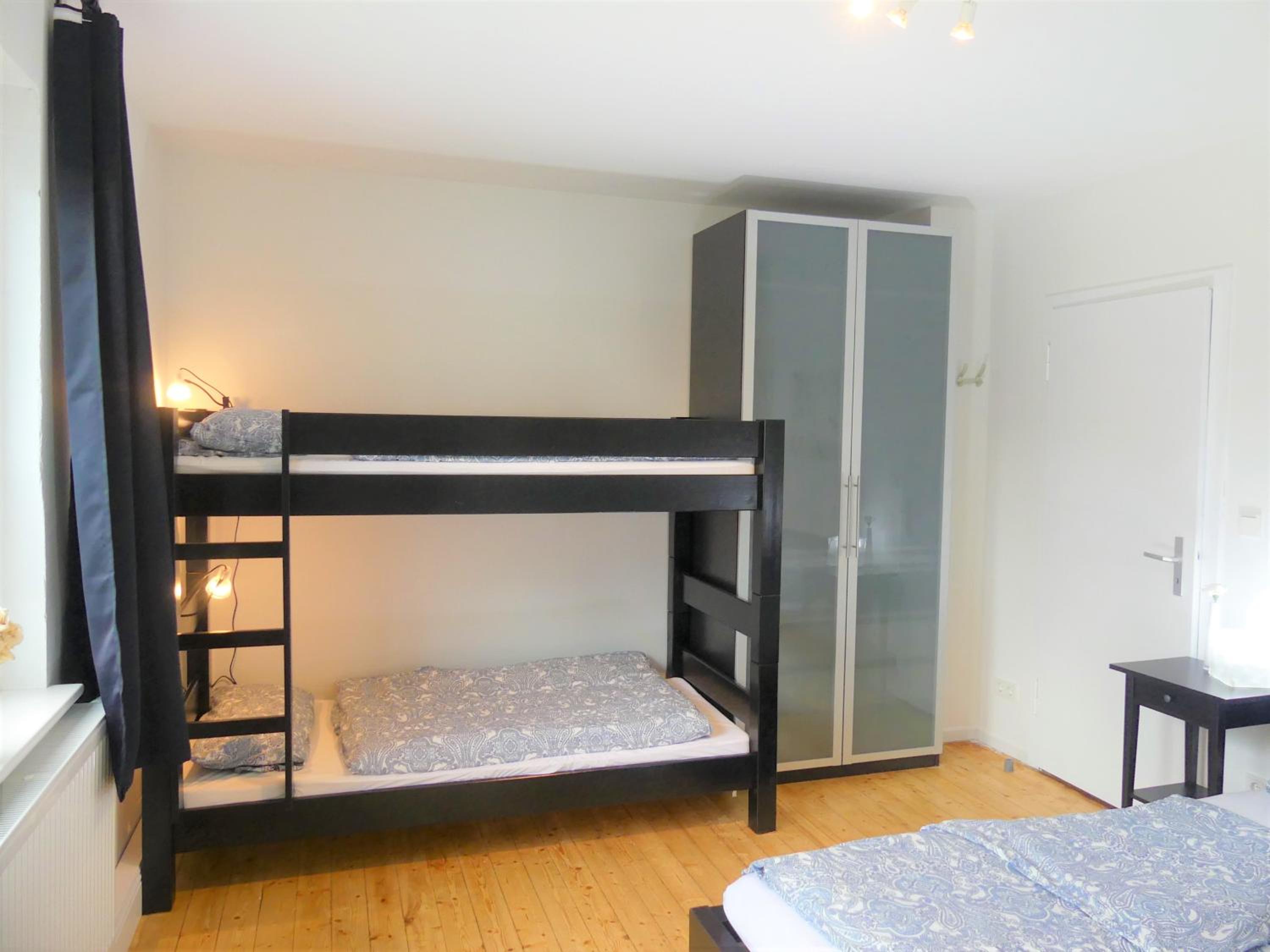 Ferienhaus Beerennest en Butjadingen — bedroom