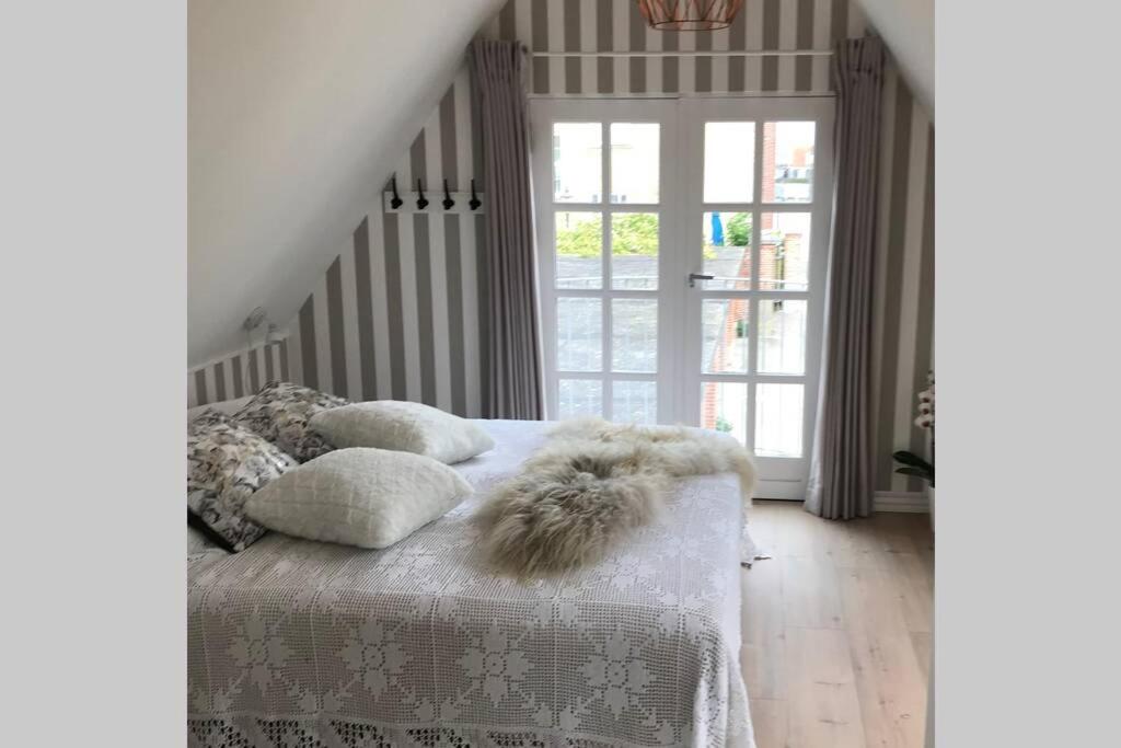 Penthouselejlighed med havneudsigt
