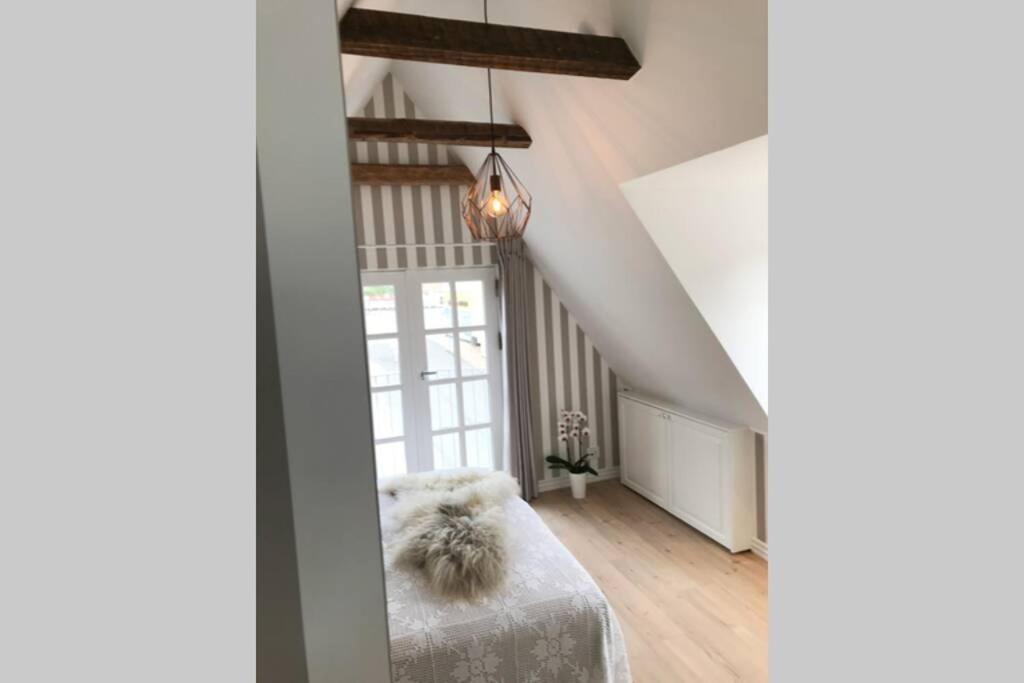 Penthouselejlighed med havneudsigt
