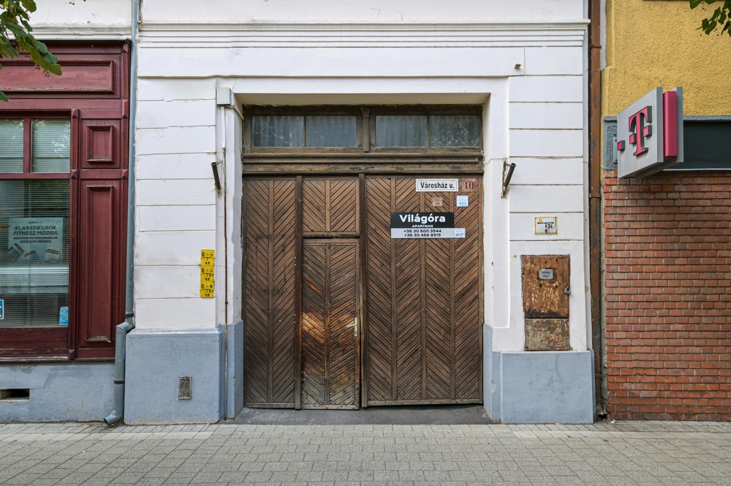 Világóra Apartman