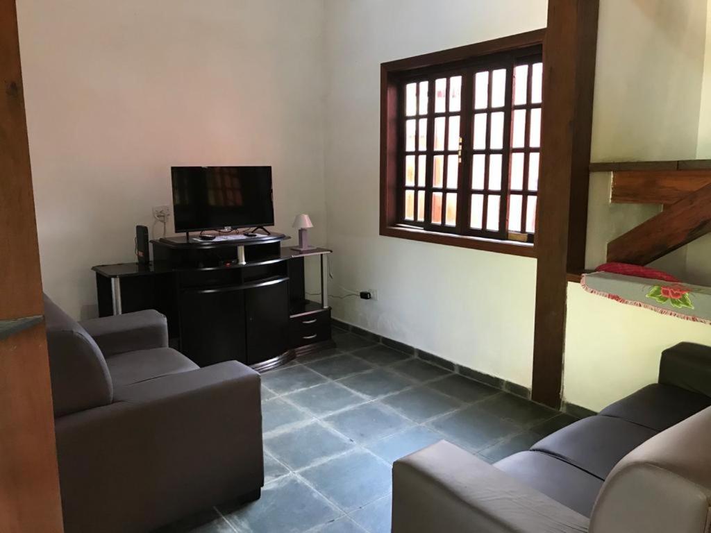 Casa de praia com piscina e clima de montanha
