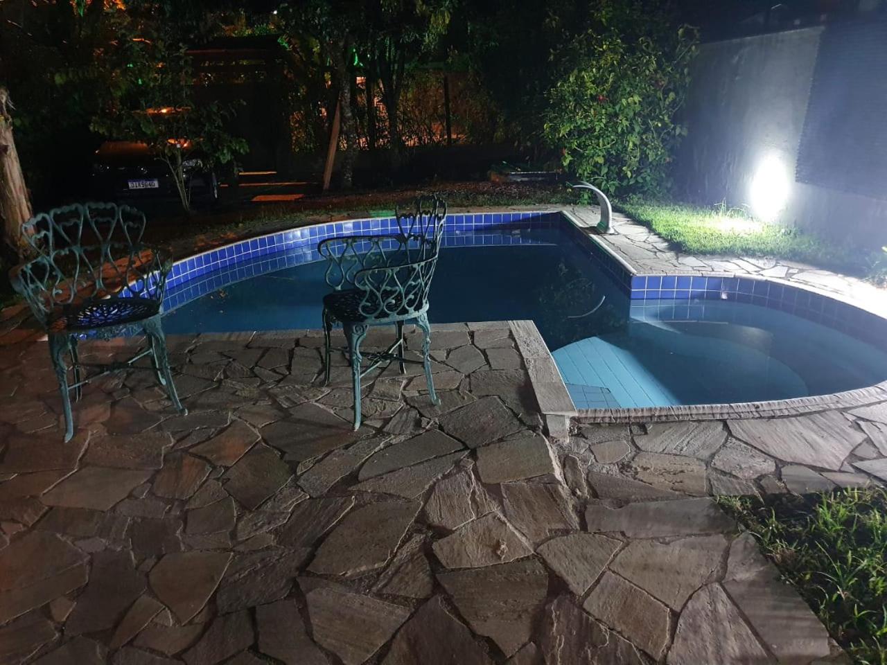 Casa de praia com piscina e clima de montanha