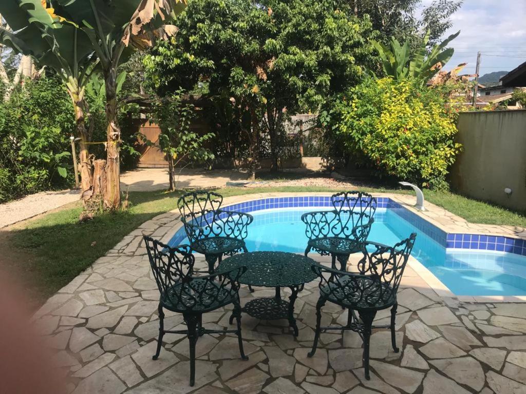 Casa de praia com piscina e clima de montanha