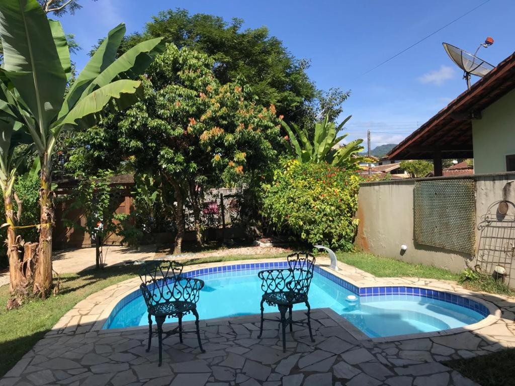 Casa de praia com piscina e clima de montanha