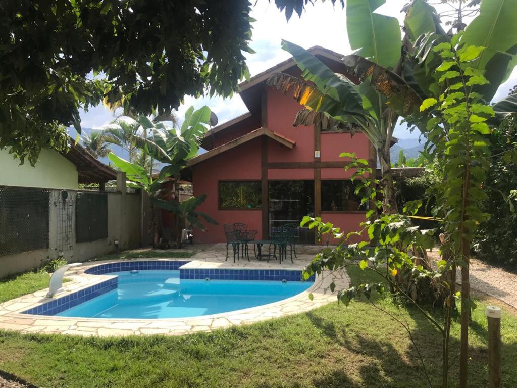 Casa de praia com piscina e clima de montanha