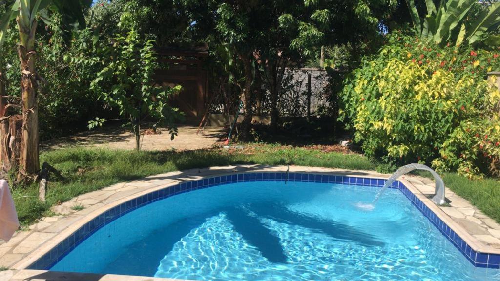 Casa de praia com piscina e clima de montanha