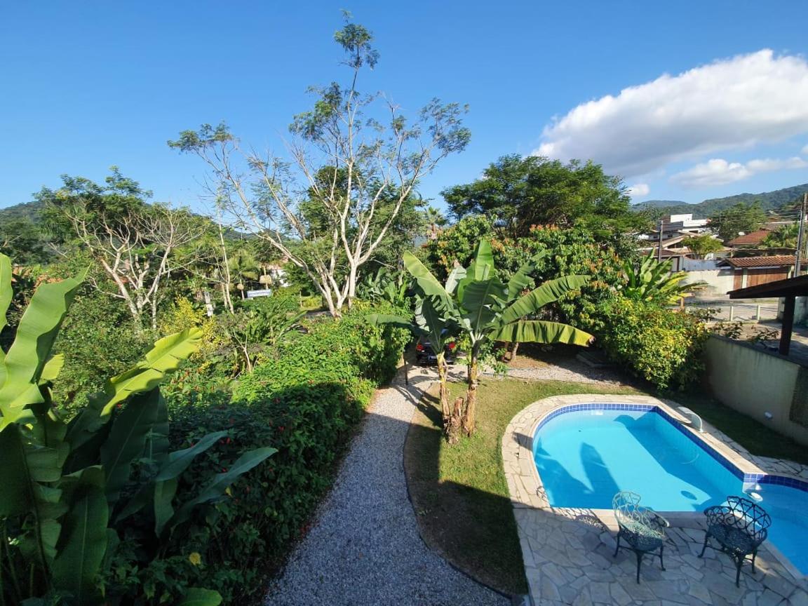 Casa de praia com piscina e clima de montanha