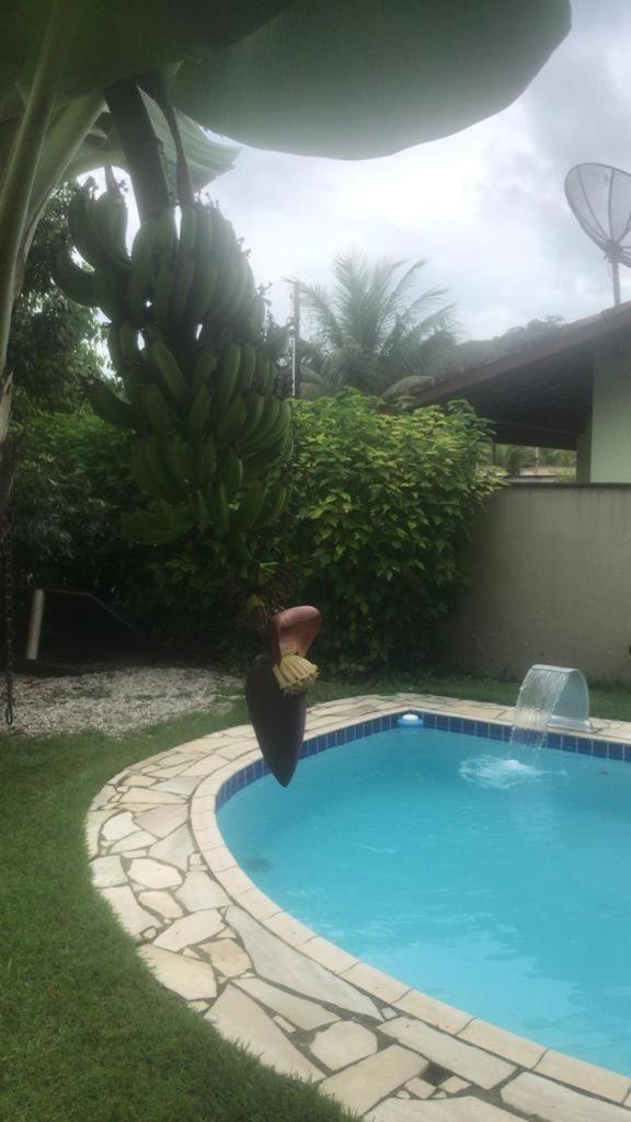 Casa de praia com piscina e clima de montanha