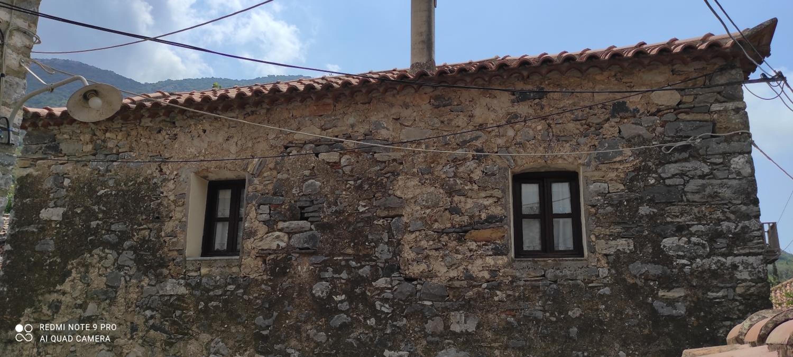 POLLY FOURNAROU tower-house view 3