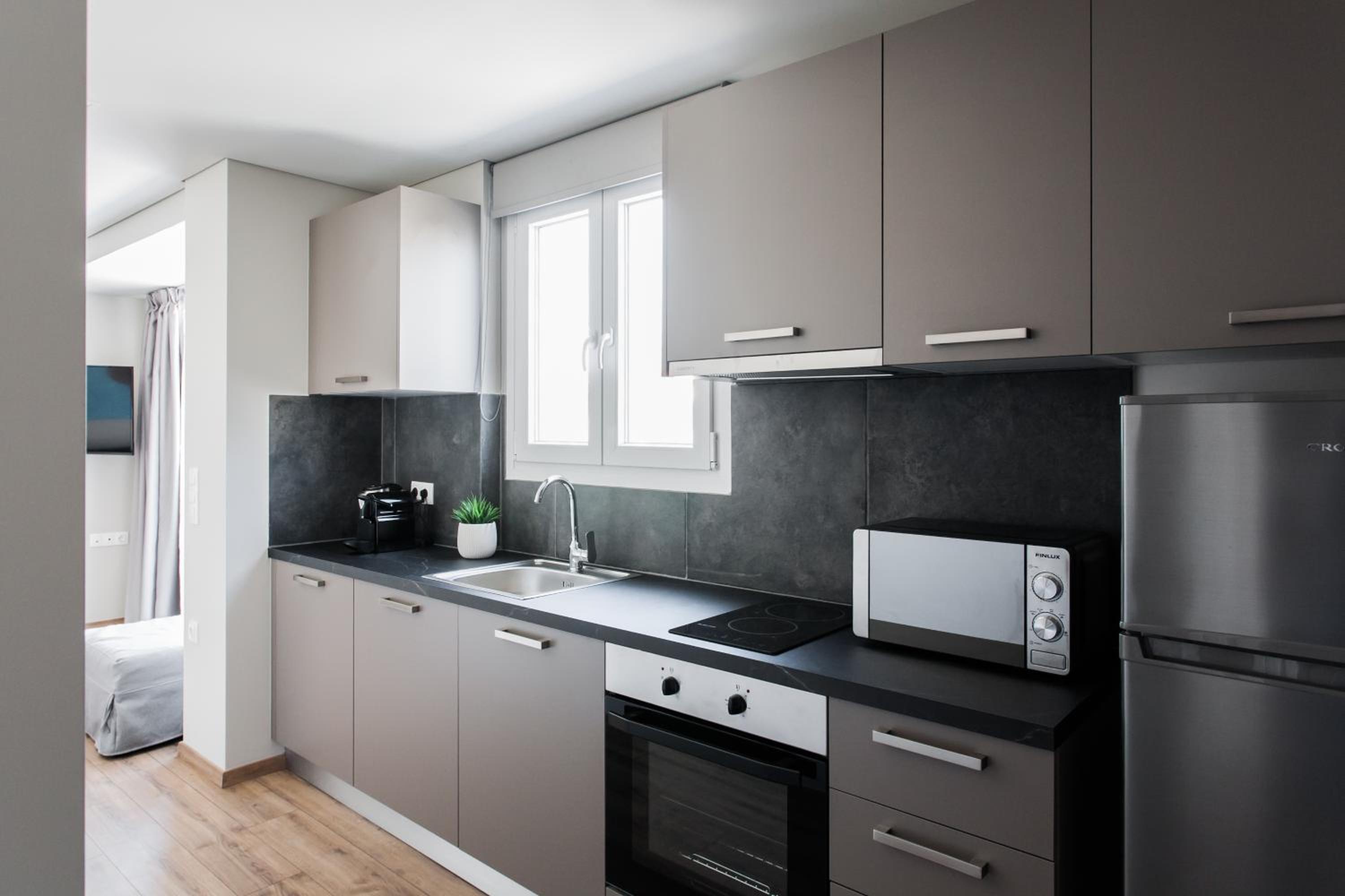 WYZ Athens Apartments by UPSTREET